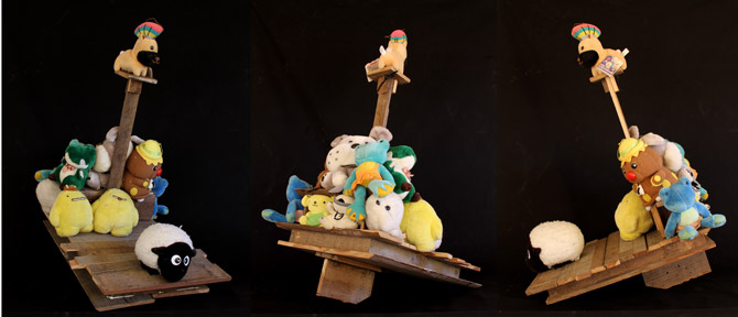 Floating Friends Stuffed animals bought at a Japanese flea market atteched to a wooden boat
