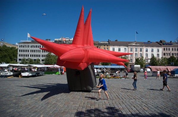 Big Red Children running after an inflatable suit in Vaasa, Finland