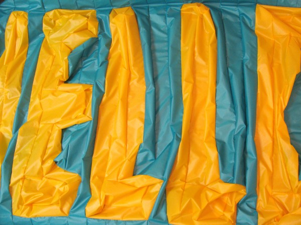 Yellow Letters New inflatable suit will have yellow letters on the front side