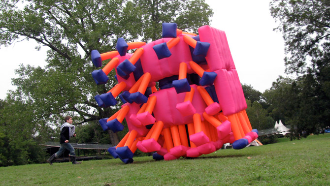 Art Outside Boy chasing an inflatable suit made by Jimmy Kuehnle at Art Outside 2009 at Apache Pass