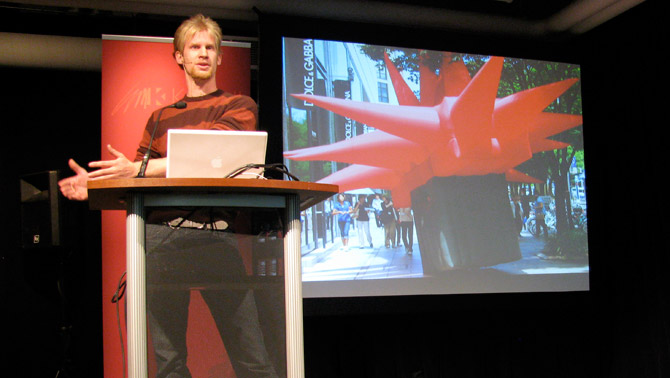 Jimmy Kuehnle giving an artist talk at Kendall College of Art and Design