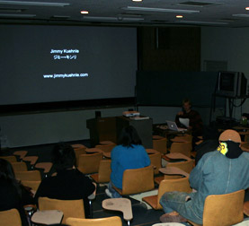 Artist Talk Inflatable suit standing in Japanese crosswalk
