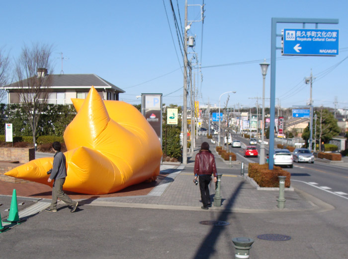 Jimmy Kuehnle heading for the street in his inflatable suit