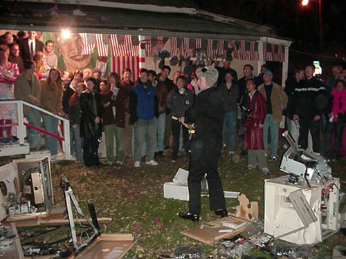 King Kjell Hahn is surrounded by his art crowd minions at the Tom Thumb Gallery in Kirksville, MO