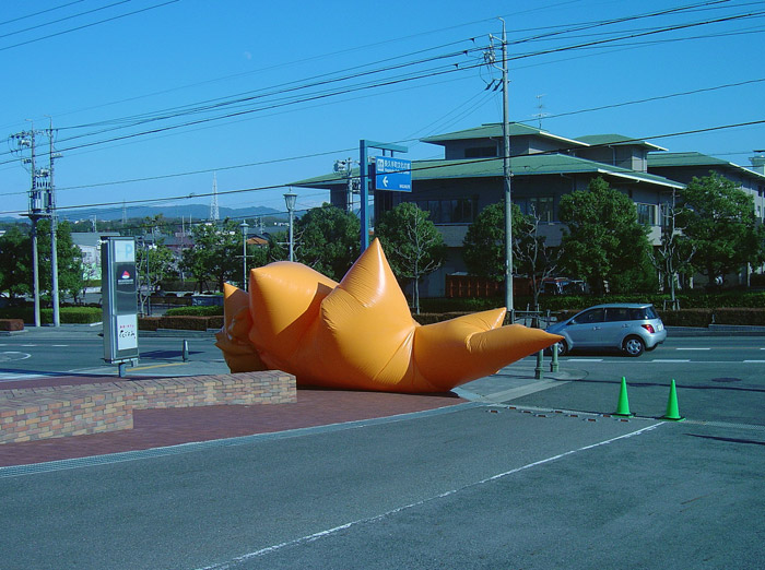Inflatable suit on a sidewalk in Nagoya, Japan.