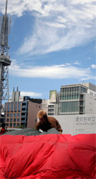 Jimmy Kuehnle unpacks his inflatable suit in Nagoya, Japan.