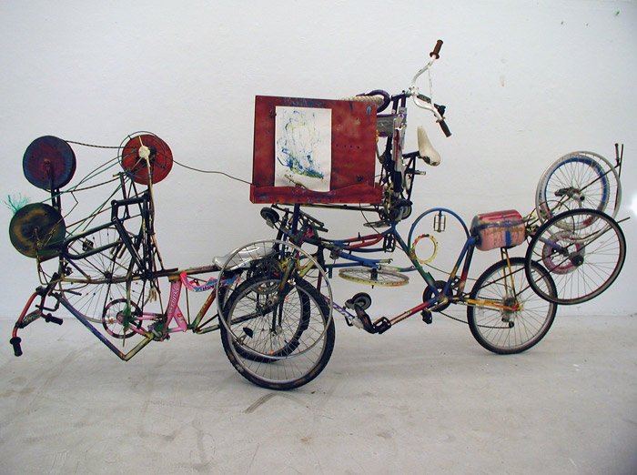Drawing machine attached to a bicycle in the studio.