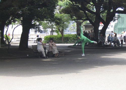Jimmy Kuehnle gets in close to two Japanese women sitting on a bench in Ueno Koen in Tokyo, Japan.