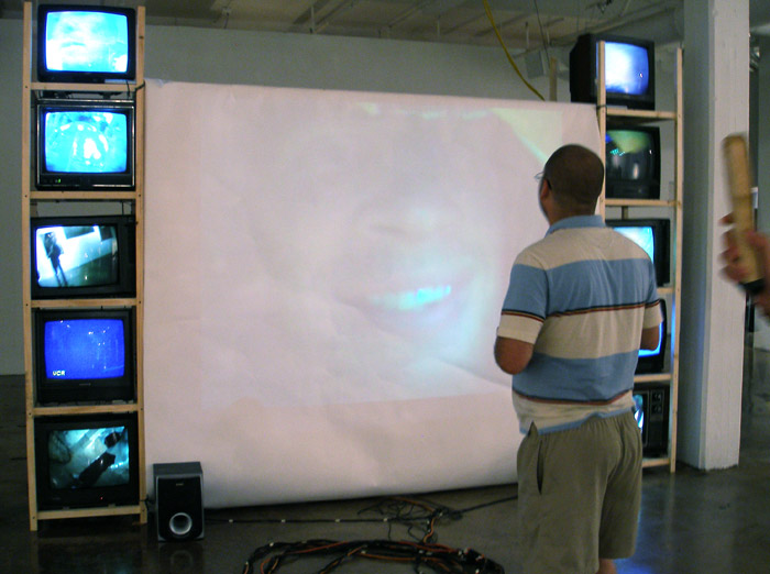 George Zupp watching a screen.