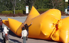 Giagantic inflatable suit performance in Nagoya, Japan.