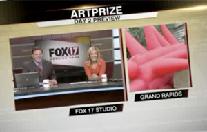Emily Richett of FOX 17 News interviews inflatable artist Jimmy Kuehnle during ArtPrize.
