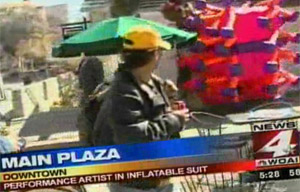 Discussion by news anchors about a performance art piece earlier in the day